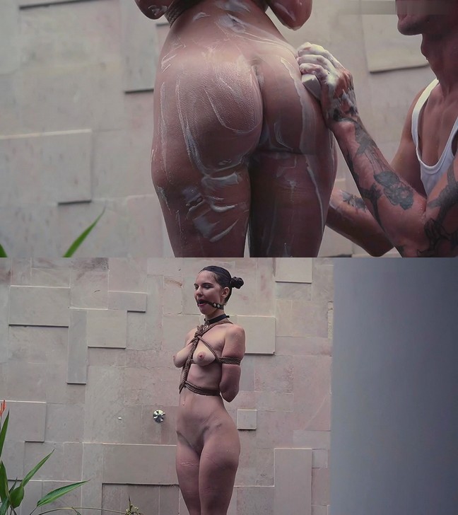 Shibari Kalahari – Sangini – Master washes his bound slave in outdoors shower